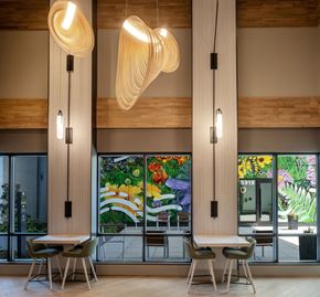 Alexandria apartment for rent - the lobby of a restaurant with tables and chairs and large windows