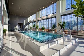 Minneapolis apartment for rent - a large indoor swimming pool with large windows