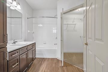Estero apartment for rent - A bathroom with a walk-in shower and a sink.