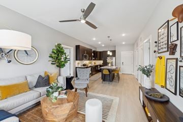 Summerville apartment for rent - A living room with a white couch and a wooden coffee table.