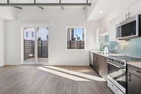 St. Petersburg apartment for rent - A kitchen with a stainless steel oven and microwave.