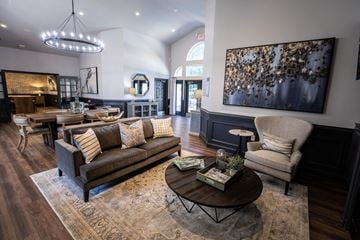 Salisbury apartment for rent - A living room with a brown leather couch and a coffee table.