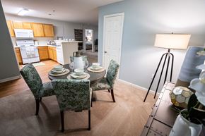 Salisbury apartment for rent - A dining room with a table set for four.
