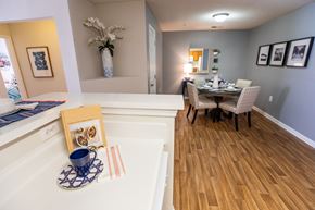 Lynchburg apartment for rent - A dining room with a table set for two.