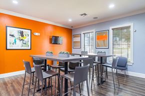 Gainesville apartment for rent - A dining room with a table and chairs.