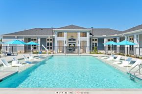 Tomball apartment for rent - Resort style saltwater Pool with tanning deck at Haven at Treeline Apartments in Tomball, Tx located at 17448 N Eldridge Pkwy, Tomball, TX 77377