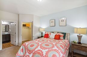 Charlotte apartment for rent - a bedroom with a bed and two night stands