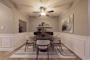 Birmingham apartment for rent - A dining room with a table set for six.