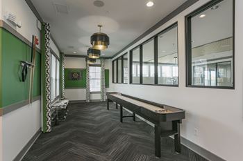 Pool table, shuffleboard table, and darts