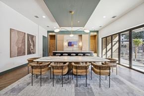 Flower Mound apartment for rent - A conference room with a long table and chairs.