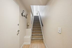 Phoenix apartment for rent - A staircase with a light switch on the wall.