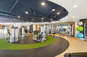 San Antonio apartment for rent - A gym with a variety of equipment including weights and exercise balls.