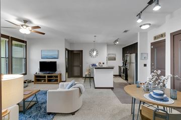 Atlanta apartment for rent - a living room with a couch and a table