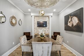 Fort Worth apartment for rent - A dining room with a table set for four.
