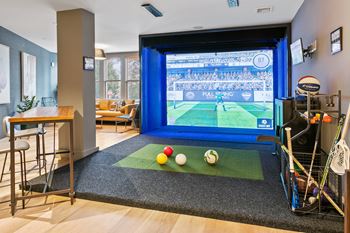 Resident sports simulator with equipment