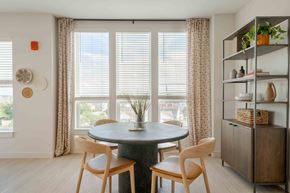 Waltham apartment for rent - A dining room with a round table and chairs.