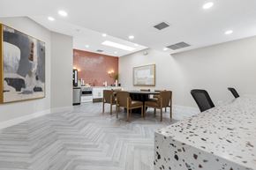 Hollywood apartment for rent - A dining room with a table set for six.