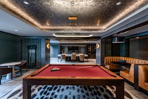 Arlington apartment for rent - a game room with a pool table and a bar