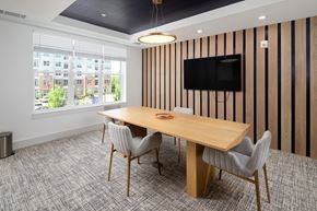 Morrisville apartment for rent - A conference room with a long table and chairs.