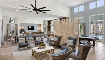 Charleston apartment for rent - an open living room with a pool table and a dining room
