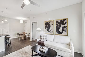 Nashville apartment for rent - a living room with a white couch and a coffee table