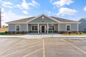 Belton apartment for rent - A small building with a parking lot in front.