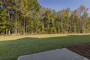 Guyton apartment for rent - a large lawn with trees in the background