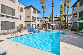 Phoenix apartment for rent - Pet-Friendly Garden-Style Apartments in Arcadia, AZ - Ingleside - Resort Style Swimming Pool With Lounge Seating, Shaded Umbrellas, Palm Trees, And Surrounding Garden Style Apartment Buildings.