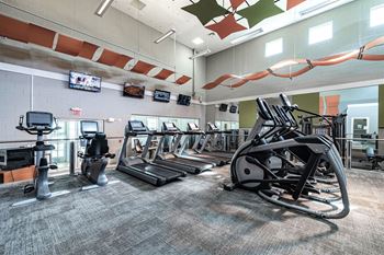 Fitness center at cumberland park apartments in orlando, florida