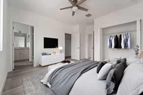 Oakland Park apartment for rent - a bedroom with a bed and a ceiling fan