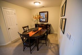 Greensboro apartment for rent - A dining room with a table and chairs.