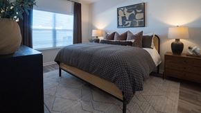 Ringgold apartment for rent - Primary bedroom with king size bed and large window.