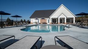 Ringgold apartment for rent - Resort-style pool with ample seating, lounge chairs and umbrellas.