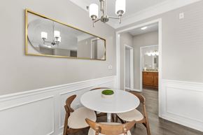 Kansas City apartment for rent - A dining room with a white table and chairs.
