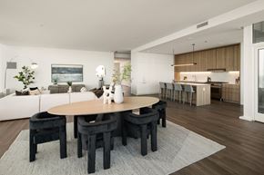 Chicago apartment for rent - A modern dining room with a wooden table and chairs.