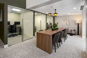 Chicago apartment for rent - A conference room with a long table and chairs.