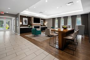 Arlington Heights apartment for rent - A modern dining room with a wooden table and chairs.