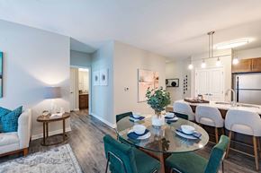 Roanoke apartment for rent - A dining room with a glass table and chairs.