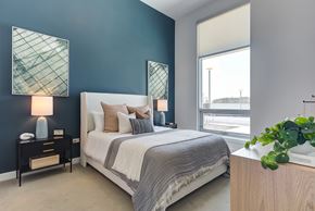 Naperville apartment for rent - a bedroom with a bed and a window