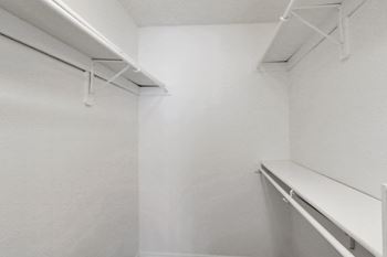 Expansive closets with built-ins in primary bedrooms