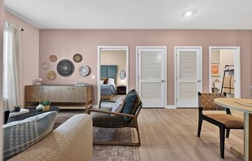 Waltham apartment for rent - A living room with a brown sofa and a wooden coffee table.