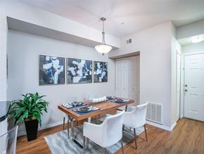 Orlando apartment for rent - a dining room with a table and chairs