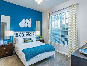 Orlando apartment for rent - a bedroom with a bed and a window