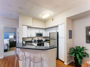 Orlando apartment for rent - a kitchen with a counter top and a refrigerator