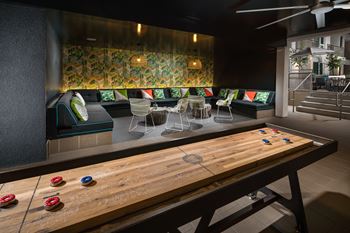 Fresh air game lounge with shuffleboard