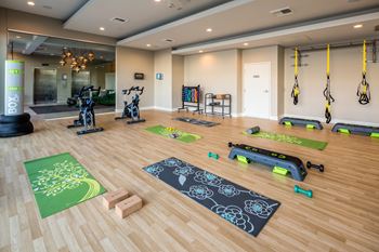 Yoga studio with virtual fitness training classes