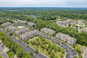 Knightdale apartment for rent - A bird's eye view of a residential area with multiple apartment buildings and a parking lot.