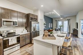 San Antonio apartment for rent - OXLY Kitchen with Island and Cabinets