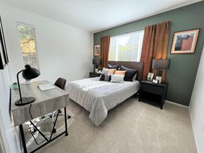 Littleton apartment for rent - a bedroom with a bed and a desk