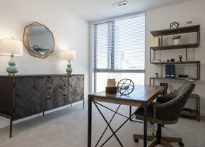 Kansas City apartment for rent - a home office with a desk and a window